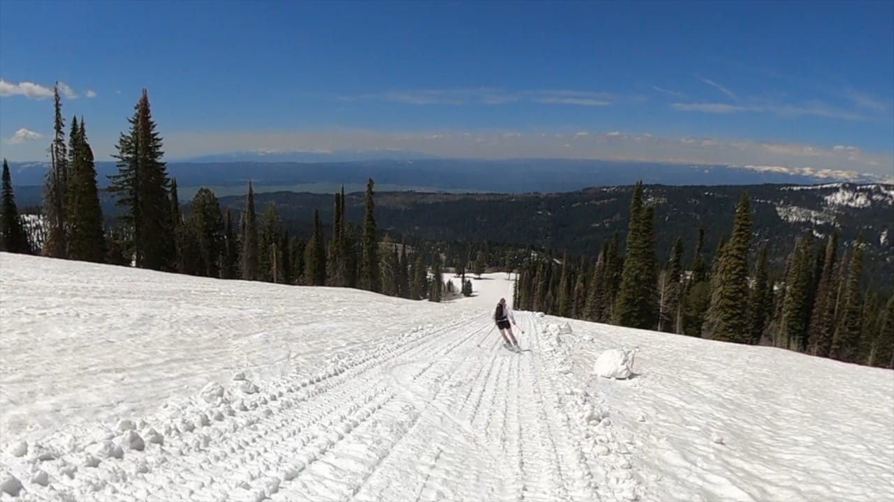 Girl skiing down a groomer track at Brundage Mountain Resort.